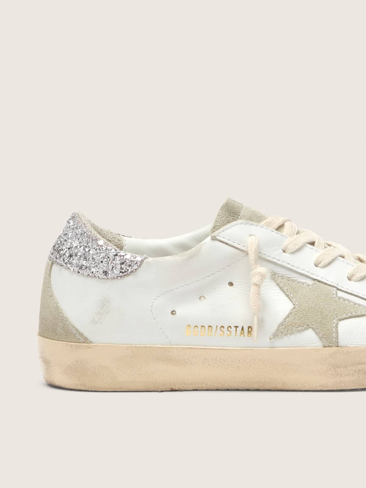 Golden Goose Super-Star Donna con stella grigia e talloncino in glitter argento